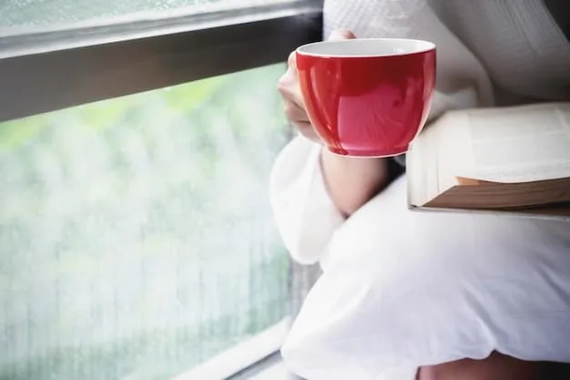A person enjoying a cup of tea and reading a book in a cozy setting by a window, representing relaxation and self-care.