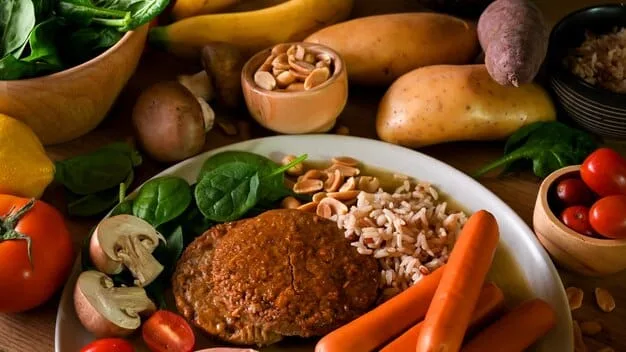A close-up shot of a colorful plate filled with a variety of fresh vegetables, lean protein, and whole grains, showcasing a balanced and nutritious meal.