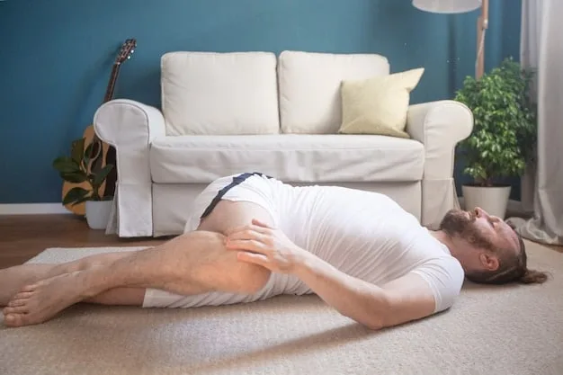 A person lying on their back with one hand on their chest and the other on their stomach, demonstrating the correct hand placement for diaphragmatic breathing, in a bright, serene room.