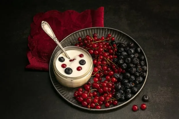 A beautifully arranged plate featuring sugar-free dessert options, such as berries with whipped coconut cream, a small serving of chia seed pudding, and a square of dark chocolate (85% cocoa or higher). The presentation is elegant, with a focus on whole, natural foods.