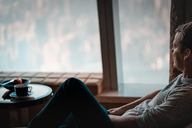 A person sitting in a comfortable chair, eyes closed, meditating and reflecting on their thoughts. Light streams in through a window, creating a peaceful atmosphere.