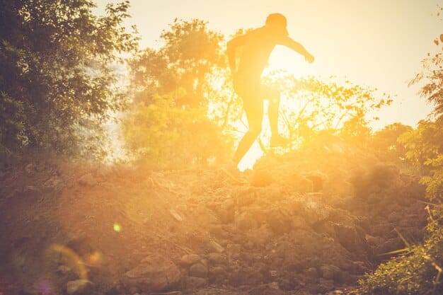 A person running uphill, encountering various obstacles (rocks, puddles, etc.), but continuing to run with determination. The background shows a motivational sunrise.