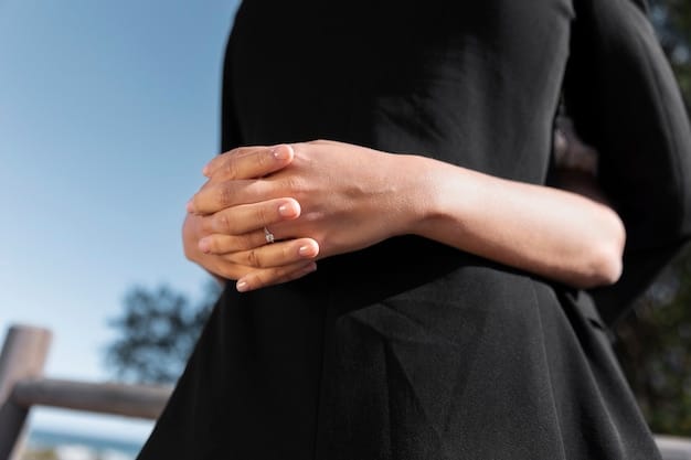 A close-up shot of two hands clasped together in a gesture of gratitude, sunlight filtering through the hands, symbolizing appreciation and thankfulness.