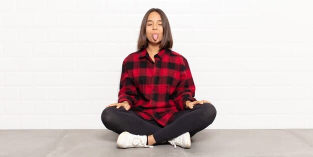 A person sitting comfortably with closed eyes, focusing on their breath with a calm and peaceful expression.