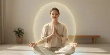 Person meditating, surrounded by a subtle protective energy field, representing healthy boundaries and self-care.