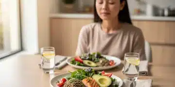 Person practicing mindful eating with a healthy meal in 2026