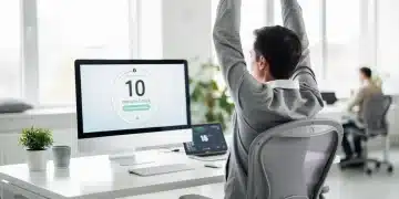 Person taking a brief, refreshing micro-break at their desk during a workday.